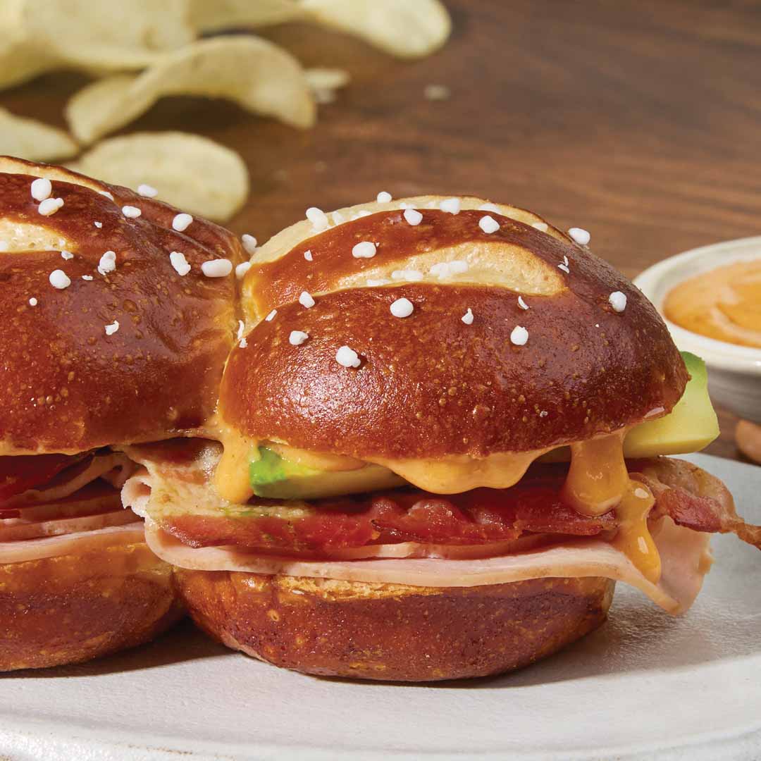 Pretzel Sliders with Smoked Turkey, Bacon, Avocado & Bistro Sauce Pretzel Sliders with Smoked Turkey, Bacon, Avocado & Bistro Sauce